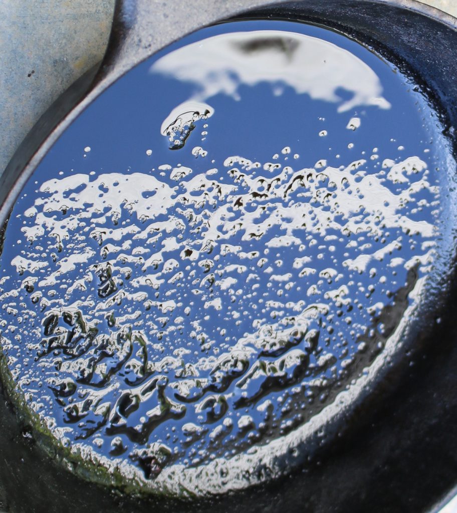 Sky reflection in a skillet bottom